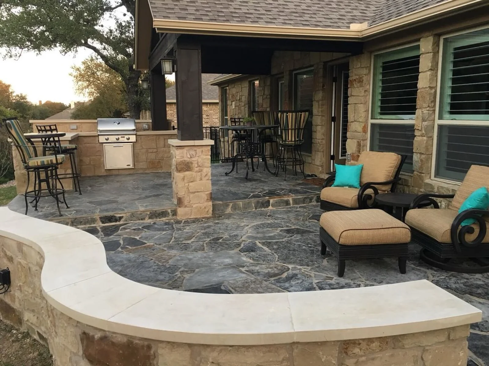 Concrete patio and landscaped outdoor gathering space